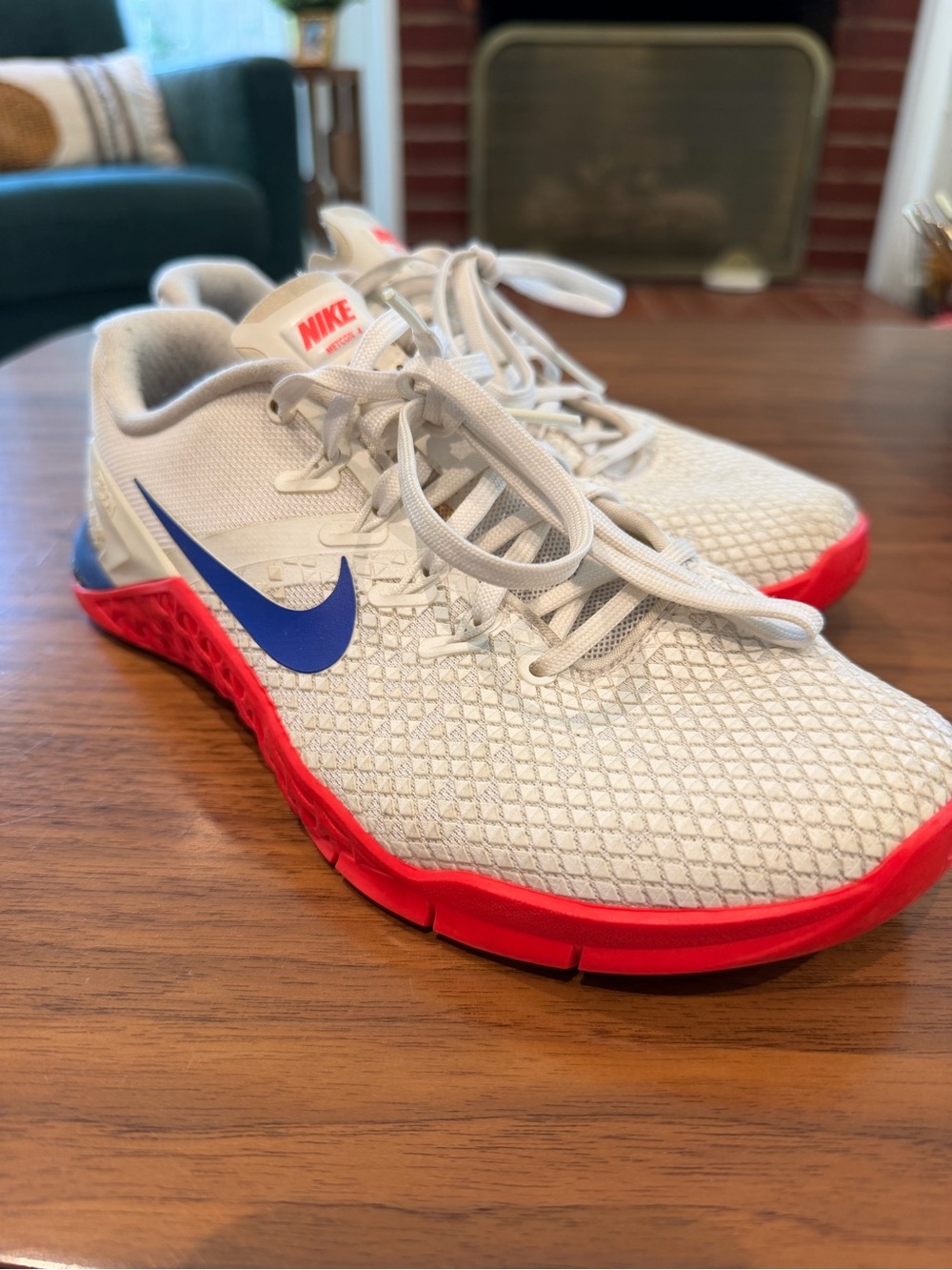 Nike Women’s White Mesh Training Shoes with Blue Swoosh and Red Outsole